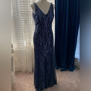 Beautiful evening dress by night Way collection size 12 beaded fits beautifully.